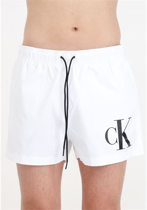 White men's swim shorts with CK monogram print CALVIN KLEIN | KM0KM01015YCD